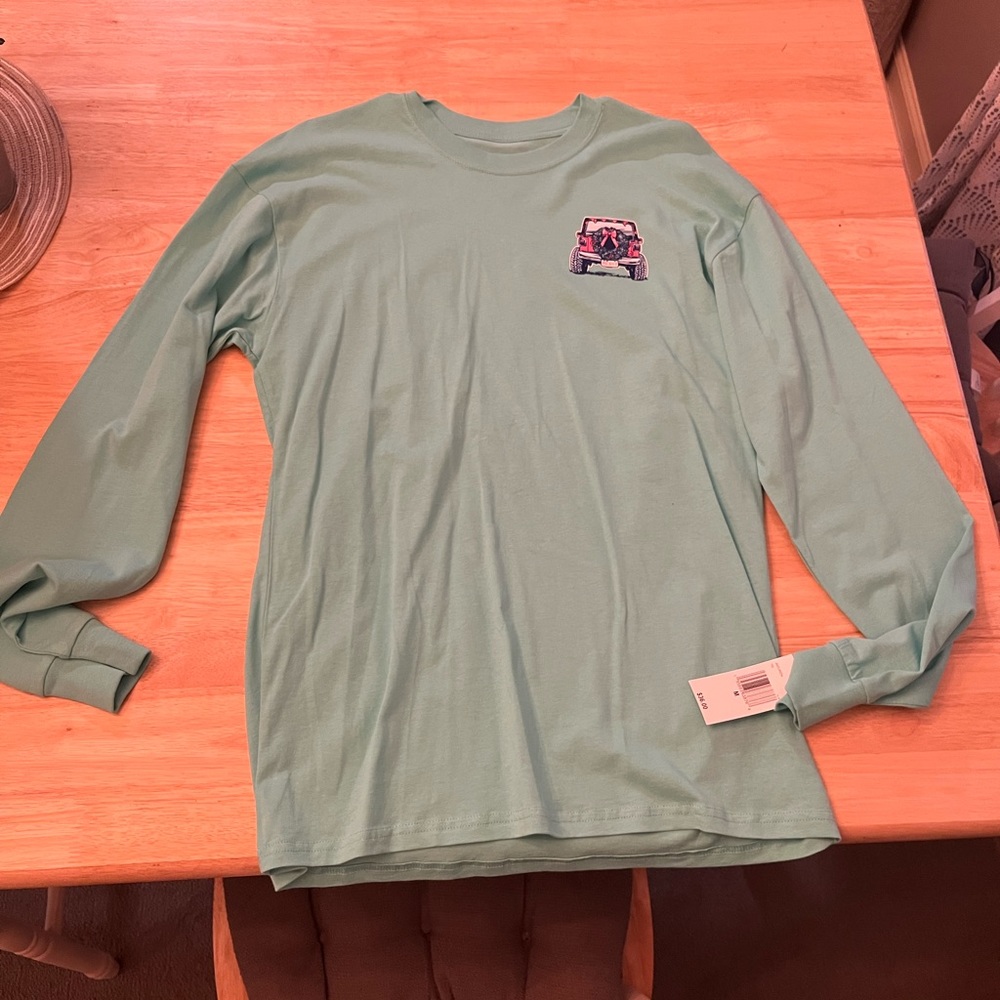 Country Christmas Jeep shirt from Kohls, size medium, teal color with pink jeep.